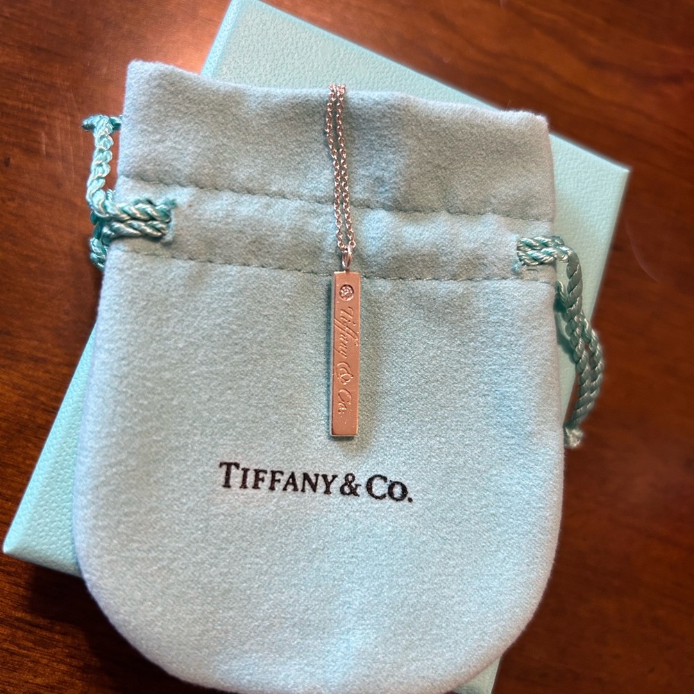 Tiffany and Co. Notes Sterling Silver and Diamond pendant.